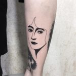 Black and white lady face tattoo