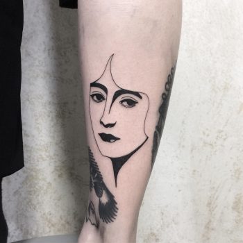 Black and white lady face tattoo