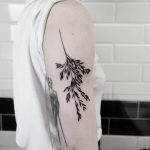Black branch tattoo by Landscape Tattoo Bastille