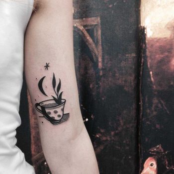 Black cup of tea tattoo