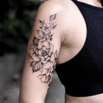 Black floral piece on the right arm