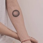Black gradient circle tattoo by Lesine Lesinex