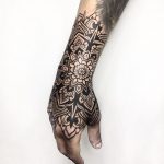 Blackwork mandala tattoo by Melow Perez