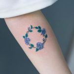 Blue roses circle tattoo