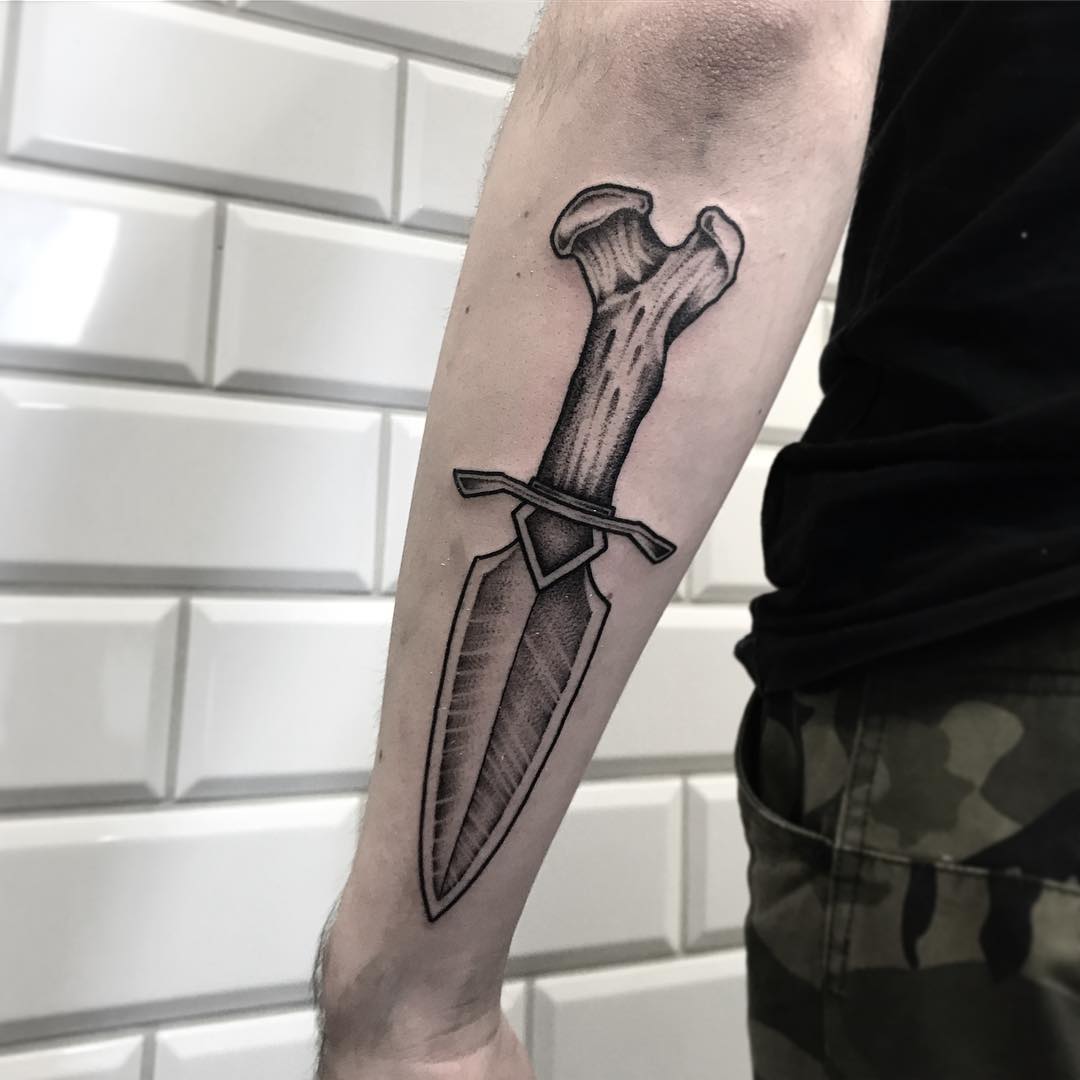 Bone dagger tattoo