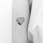 Brick wall heart tattoo