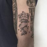 Broken column tattoo