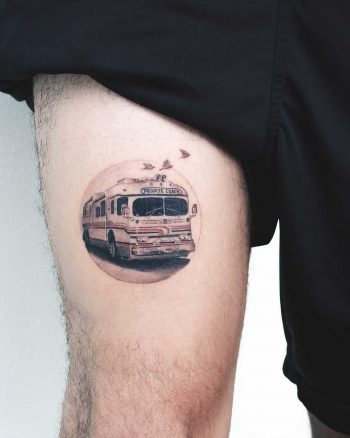 Bus tattoo on the thigh