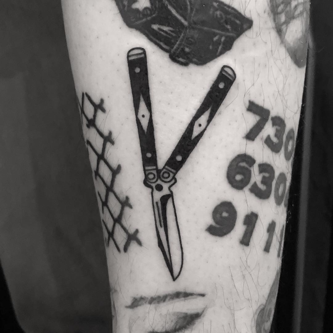 Butterfly knife tattoo done at BK Ink Studio