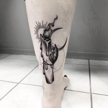 Candle, sun, and moon tattoo