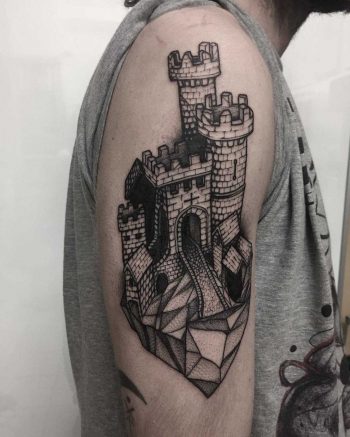 Castle on a rock tattoo