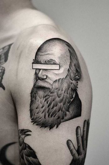 Censored face tattoo