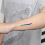 Colorful gradient line tattoo by Nano Ponto A Ponto