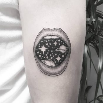Cosmic mouth tattoo