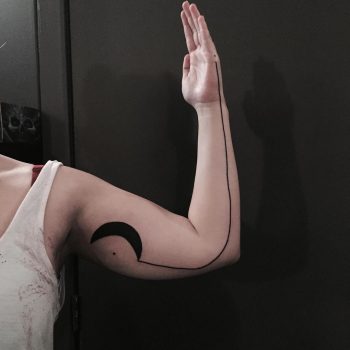 Crescent moon and line tattoo