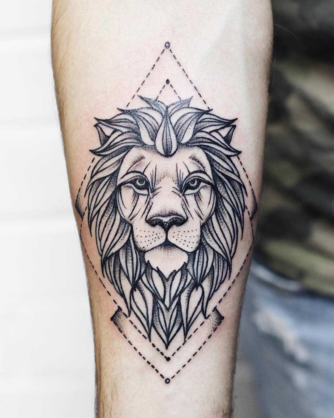 Crisp lion tattoo