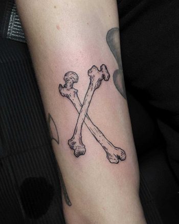 Crossed bones tattoo
