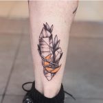 Crystal and crescent moon tattoo on the calf
