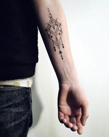 Custom symbol of luck and power tattoo