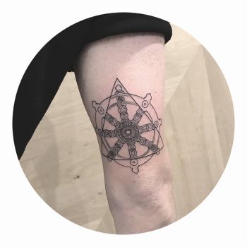 Dharma Wheel tattoo by Cholo