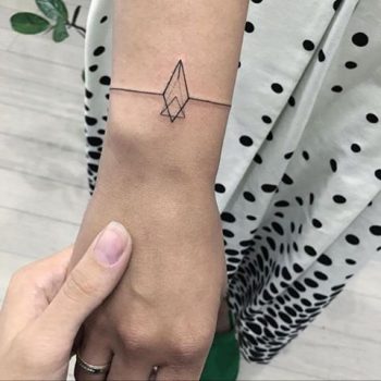 Diamond bracelet tattoo on the wrist