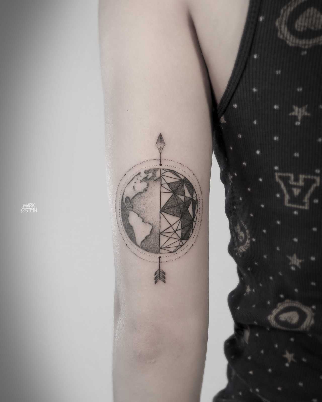 Earth and arrow tattoo