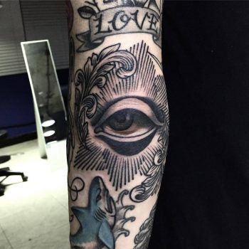 Eye tattoo on the elbow