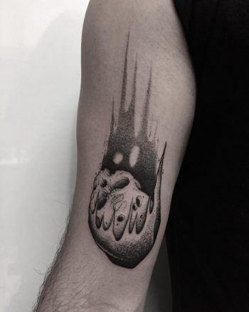 Falling skull tattoo