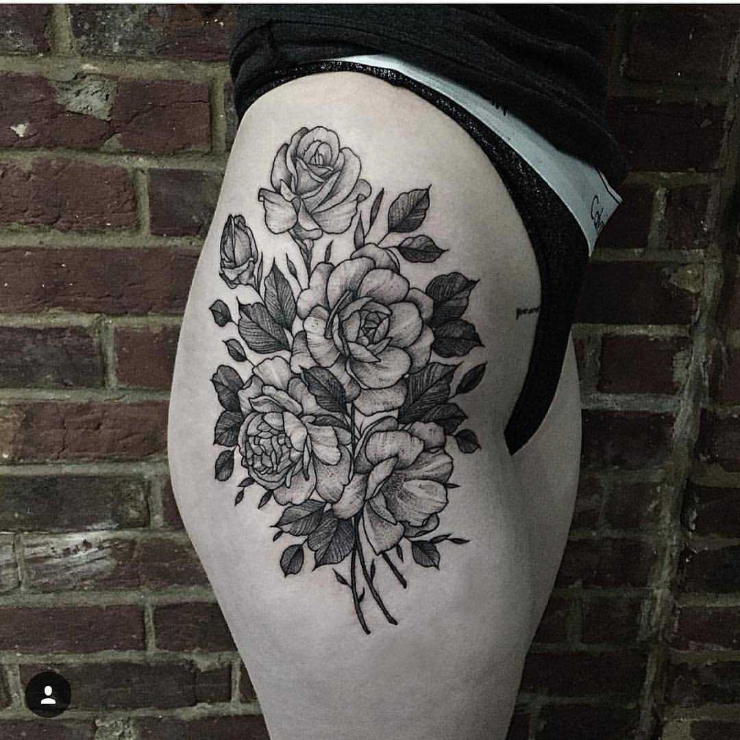 Floral piece on the hip by Thomas Bates