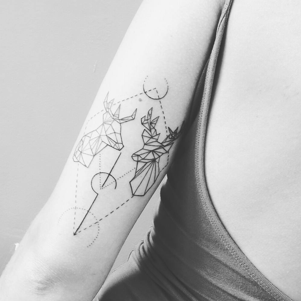 Geometric deer tattoos
