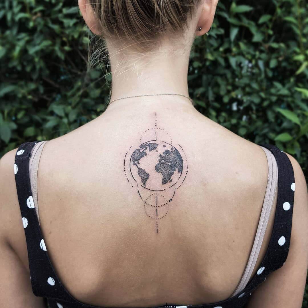 Globe tattoo on the upper back