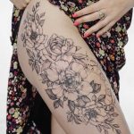 Gorgeous floral tattoo on the thigh