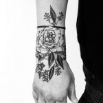 Gorgeous flower tattoo on the right hand