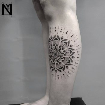 Gorgeous mandala tattoo on the shin