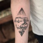 Harbor scene tattoo by Tom Tomtatts