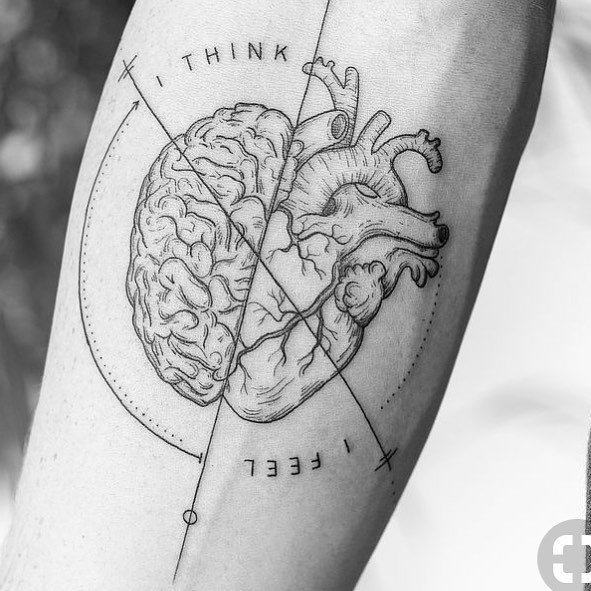 Heart and brain tattoo on the forearm