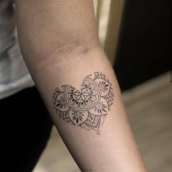 Heart-mandala tattoo
