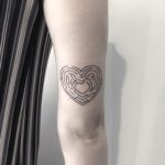 Heart maze tattoo