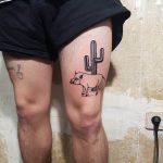 Hog and cactus tattoo on the thigh