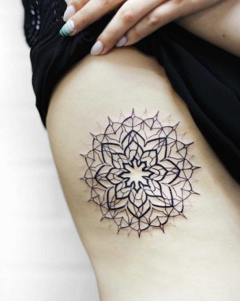 Lacy mandala tattoo