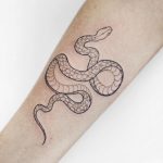 Lacy snake tattoo