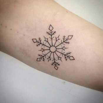 Little linear snowflake tattoo