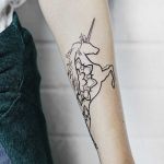 Magic unicorn tattoo
