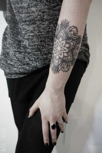 Mandala on the forearm by Alex Tabuns