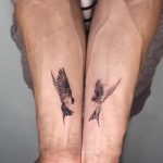 Matching bird tattoos by Bryan Gutierrez