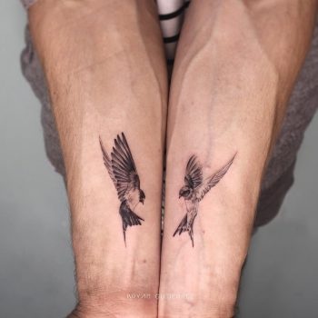 Matching bird tattoos by Bryan Gutierrez