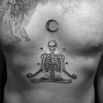 Meditating skeleton tattoo