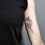 Minimalist forget-me-not tattoo