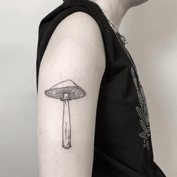 Minimalist mushroom tattoo