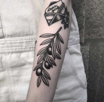 Minimalist olive branch tattoo